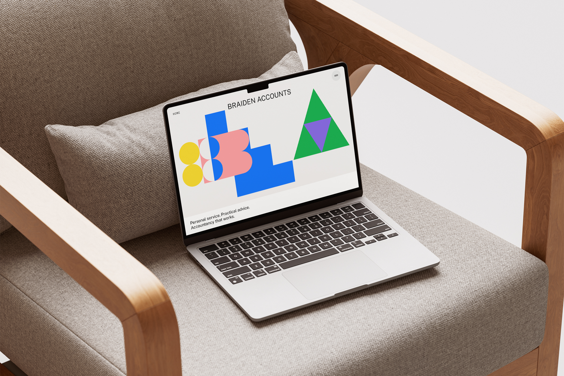 BA Mac Book on Armchair